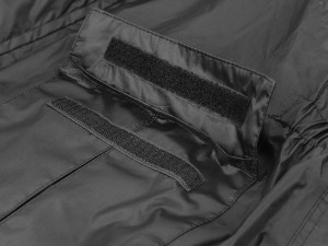 Photo showing waterproof pocket on StormRider jacket in Black on white background